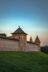 Fototapeta na wymiar The evening view of old stone fortress Kremlin in Novgorod
