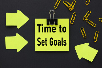 Time To Set Goals. text on a black background, on a bright yellow sticker