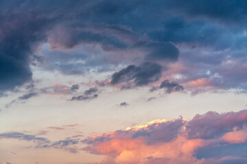 orange sunset sky with lighted clouds