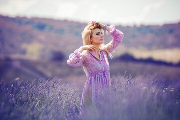 Woman on the summer lavender field
