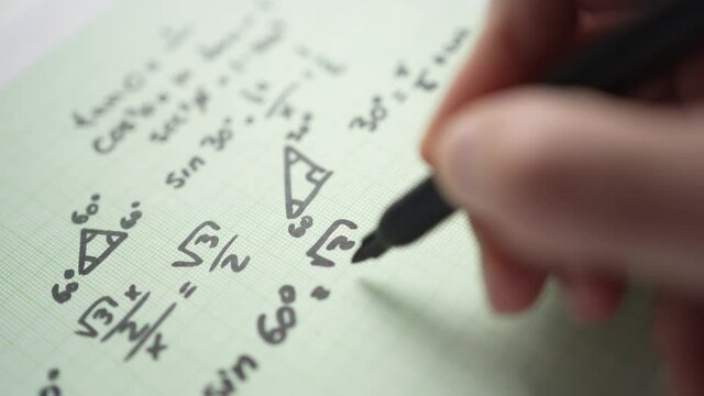 Mathematical Equations Calculation Closeup on a Paper