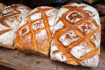 Wheat bread on wooden board.