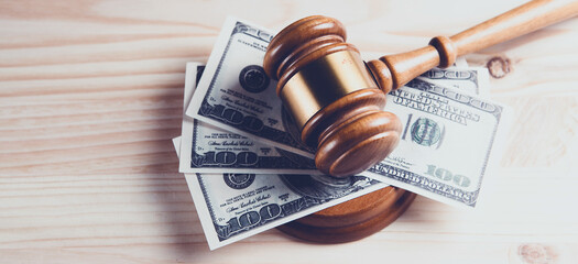 Judge gavel, dollars for business, finance, corruption, money, financial crimes