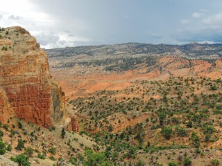  looking out at red rock cliffs and cathedral valley from the  upper south desert overlook in ...