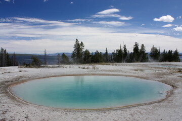 blue funnel spring next to lake yellowstone at west thumb geyser basin, yellowstone national park,...