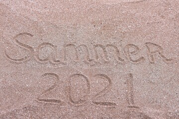 summer 2021. an inscription on the sand. . High quality photo