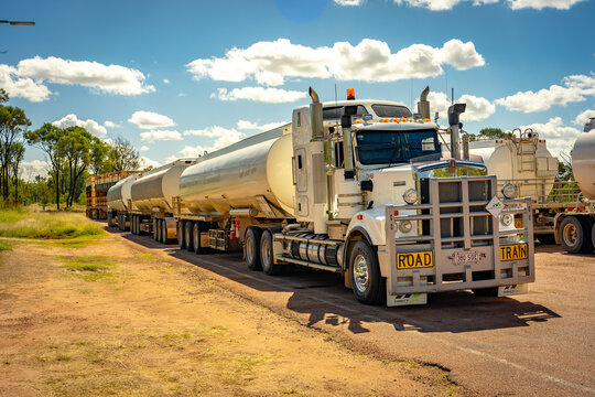 Rural Queensland, Australia - May 21, 2021: Road train Kenworth truck parked on the rural road