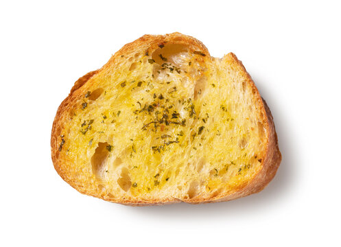 Baked bread with garlic and herbs on a white background.