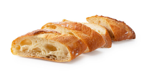 A sliced baguette placed on a white background.