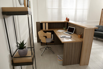 Receptionist's workplace with laptop in hotel. Interior design