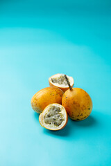 Passion fruits on a blue background