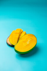 Mangoes on a blue background