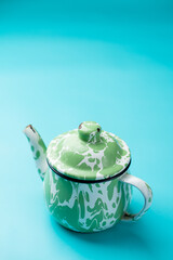 An enamel vintage teapot