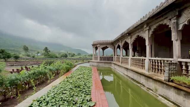 Side View Of A Hindu Temple In Western Ghats Of Maharashtra In India, Near Trimbakeshwar. slider left