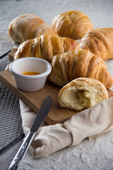 Colombian traditional milk breads with knife and jam