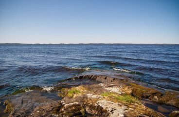 Big lake, Vanaja rocky shore with small waves
