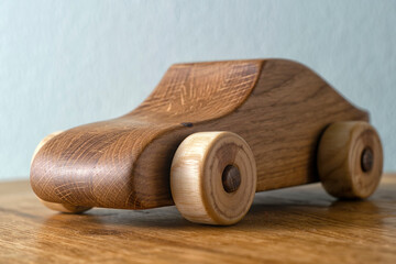 Toy car made of oak wood
