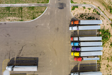 Aerial view of parking lot with trucks on transportation of truck rest area dock