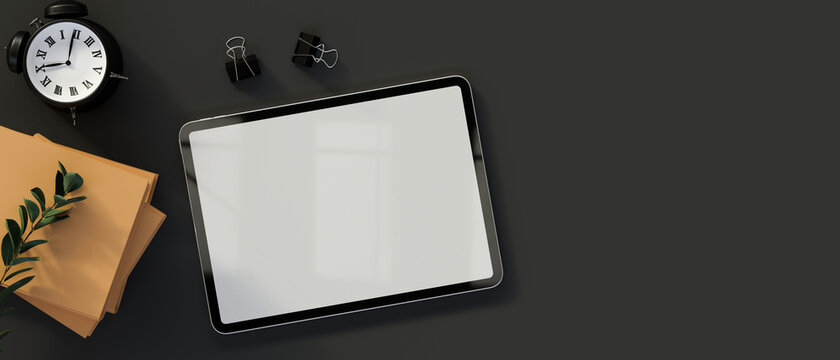 Top view of digital tablet with mock-up screen on dark table with supplies and copy space, 3D render