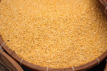Lentils are yellow colors in the traditional bamboo cage