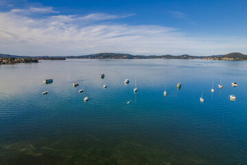 Daytime aerial waterscape with boats