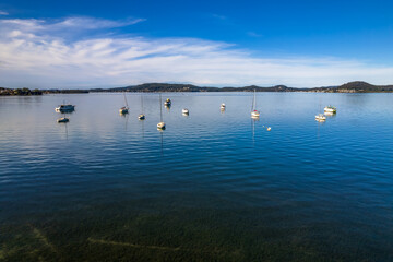 Daytime aerial waterscape with boats