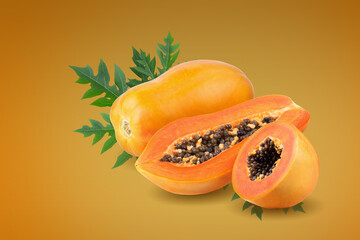 Whole and half of ripe papaya fruit with seeds on orange background