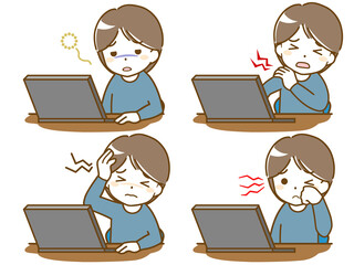 パソコン作業で疲れる若い男性