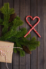 christmas wallpaper with fir branches and gift box