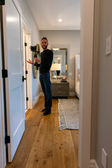 Photographer caught in the act of filming a house for real estate purposes.