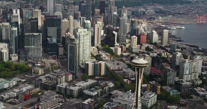 Aerial Reveal of Seattle Skyline Tilt From Space Needle to City Beyond