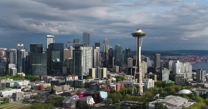 Dramatic Aerial Pan of Seattle Skyline With Space Needle in Foreground and City in Background