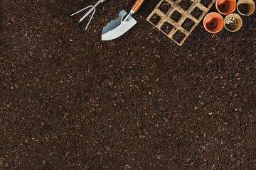 Gardening tools on soil background. Working in the garden