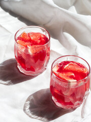 glass of grapefruit juice, slices of a grapefruit, healthy breakfast
