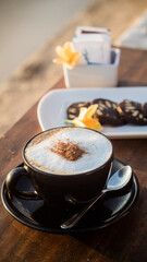 Coffee morning and cookies on wooden table