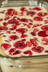 Ready-made dough with cherries in the cherry pie tin, clafoutis. Step by step recipe