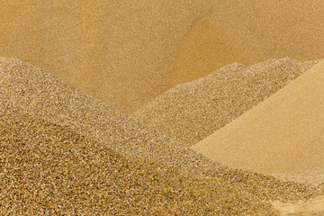 Close-up of piles of gravel of different size.