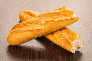 Crust tasty baguette over board