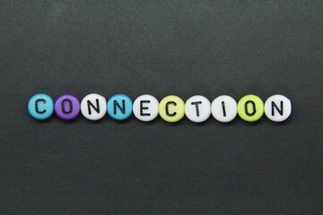 colored round cubes with the word connection