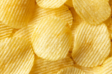 crispy golden potato chips snack texture background