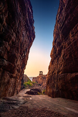 Path through cliffs, Entrance archway for lower and upper Shivalaya in Badami, Karnataka, INDIA.