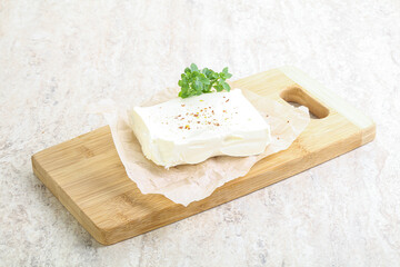 Greek Feta cheese over board