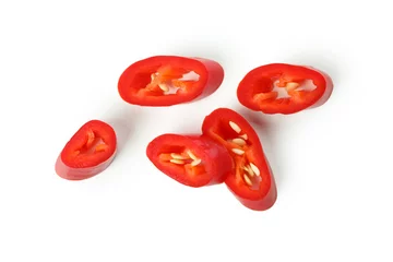 Keuken spatwand met foto Red hot chili pepper slices isolated on white background © Atlas