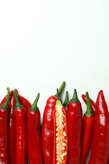 Red hot chili peppers on white background
