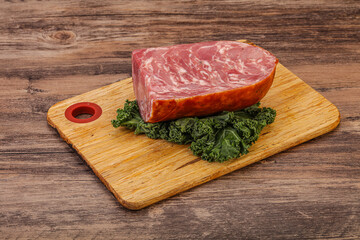 Beef ham piece over board
