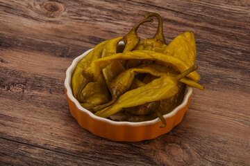 Marinated spicy and hot green pepper