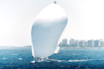 Sailing boat during a regatta in mediterranean sea