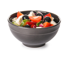 Bowl with tasty Greek salad on white background