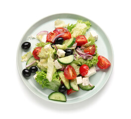 Plate with tasty Greek salad on white background