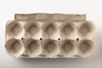 cardboard egg tray on white background